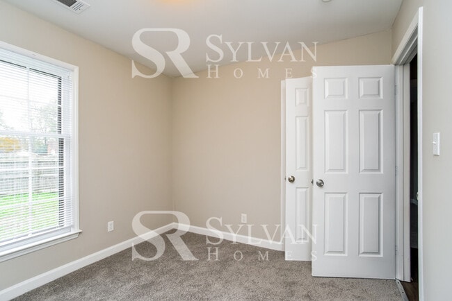 Building Photo - You'll love this charming brick home!