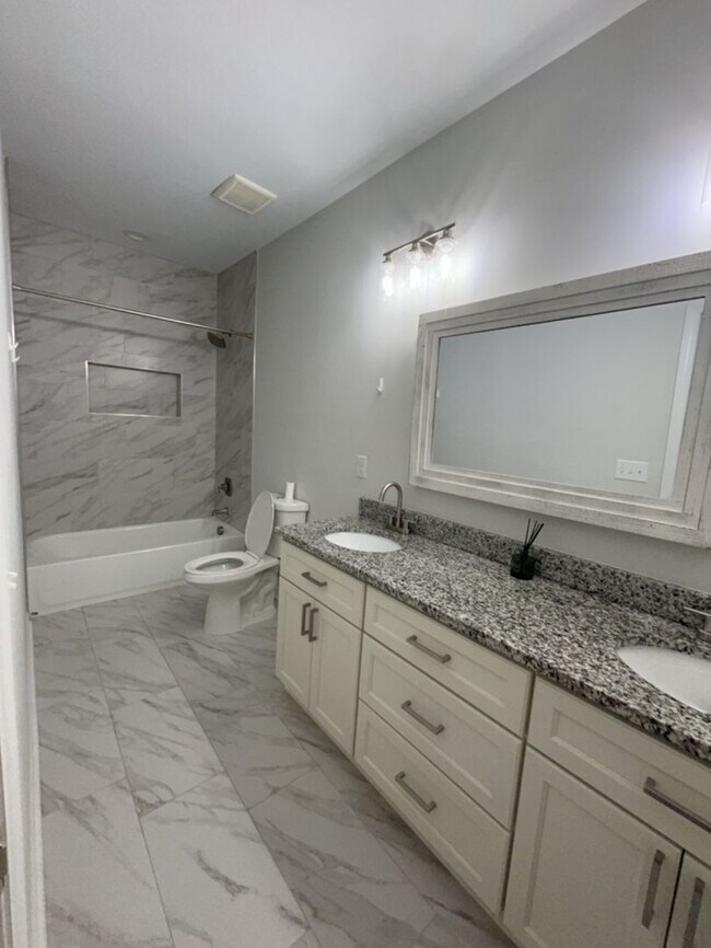 Building Photo - Modern Charm Meets Classic Comfort in This...