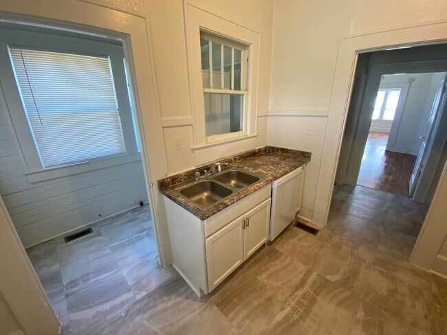 Building Photo - Huge Trinity Park Duplex with Office, Shared Fenced Yard and Adorable Porch!