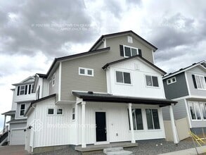 Building Photo - 9365 Twin Sisters Dr