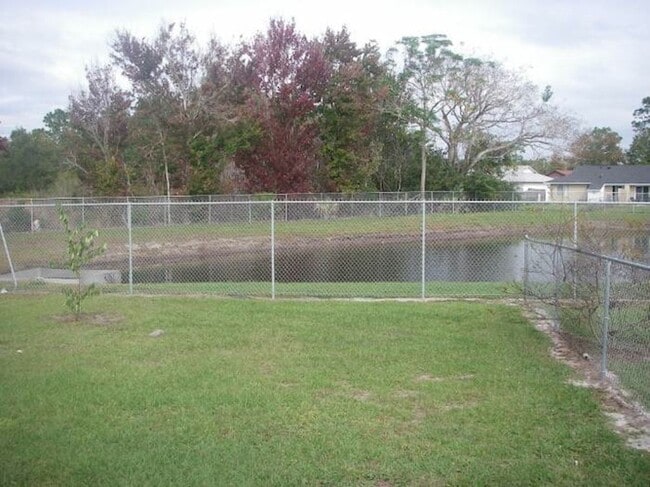 Building Photo - MOVE IN NOW! Orlando- off Dean Rd-2BR/2BA Duplex with fenced in yard. Lawn care included!!Has was...