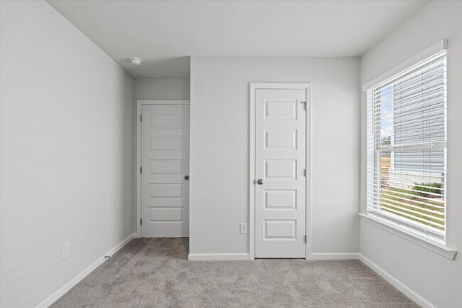 Building Photo - New 4BR Home in Whispering Woods – Spaciou...