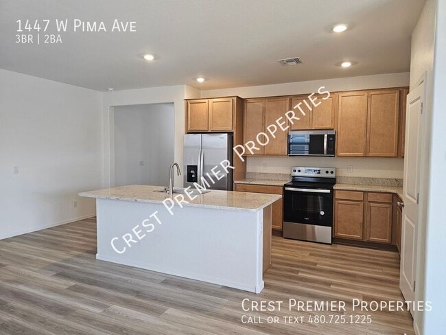 Building Photo - 1447 W Pima Ave