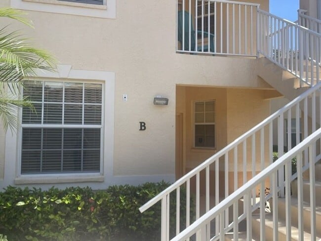 Building Photo - Elegant 3 Bedroom End-Unit Condo with Screened Lanai & Pond Views and A Private Garage