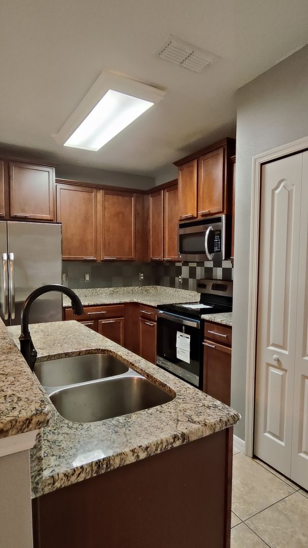 Building Photo - Prime Longwood Living 2-Bed, 2.5-Bath Townhome Near Shops & Dining