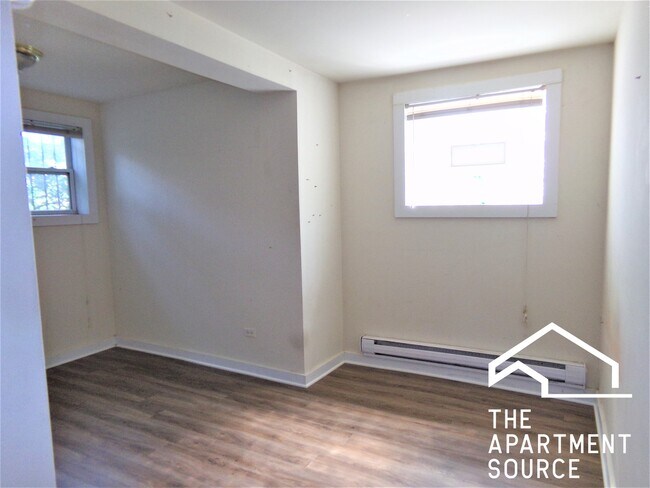 Building Photo - 6574 N Lakewood Ave