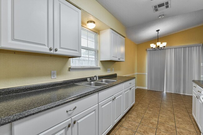 Building Photo - Cozy Living Awaits, 2BR/2BA Townhome with Fireplace