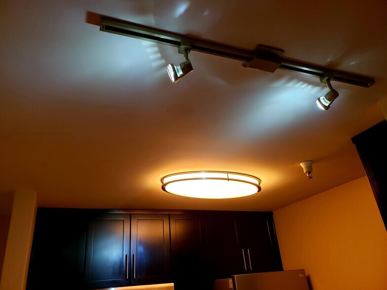 Track Lighting above Kitchen Island - 6400 Christie Ave