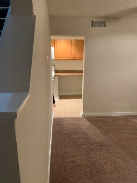 Living room into kitchen - 281 Oak Dr