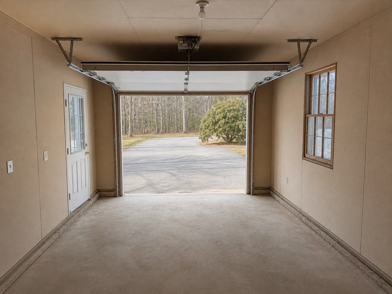 Garage door facing driveway - 217 Bigelow Hill Rd