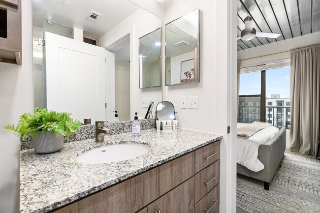 Building Photo - Midtown Magic: Big Savings + Big Perks!