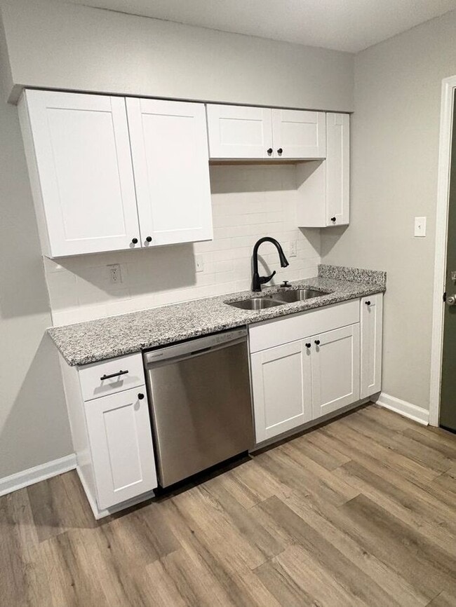 Building Photo - Steps from UofM & Highland Strip – First-Floor 2BR Apartment at The Den!