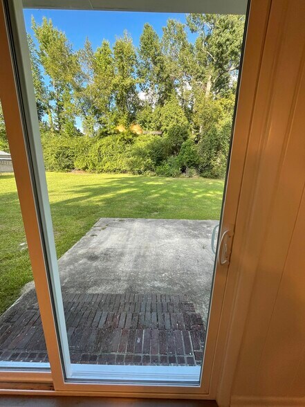 Sliding door to outside patio and backyard - 15521 Calhoun Road