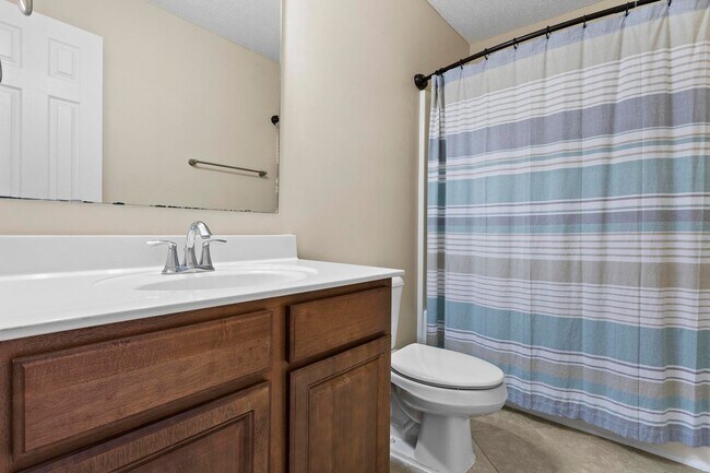 Building Photo - House with Fenced Back Yard Available!