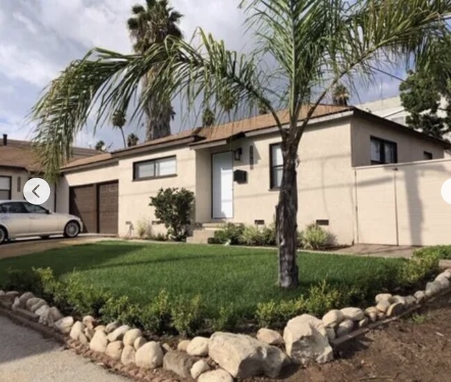 Duplex separated by garages - 25409 Belle Porte Ave