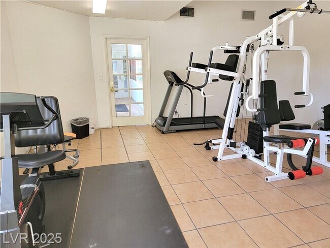 Building Photo - Inviting Green Valley Condo with Dual Balc...