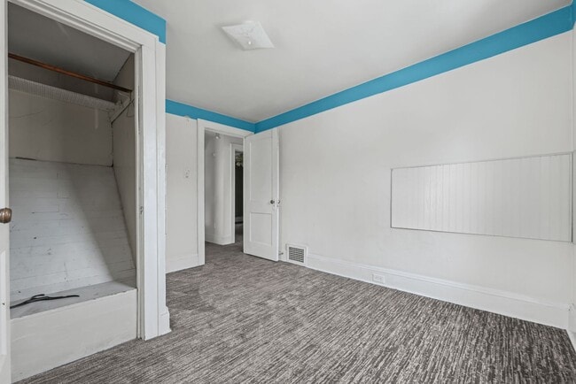 Building Photo - Bright living ? cozy dining flow for everyday comfort and easy entertaining.