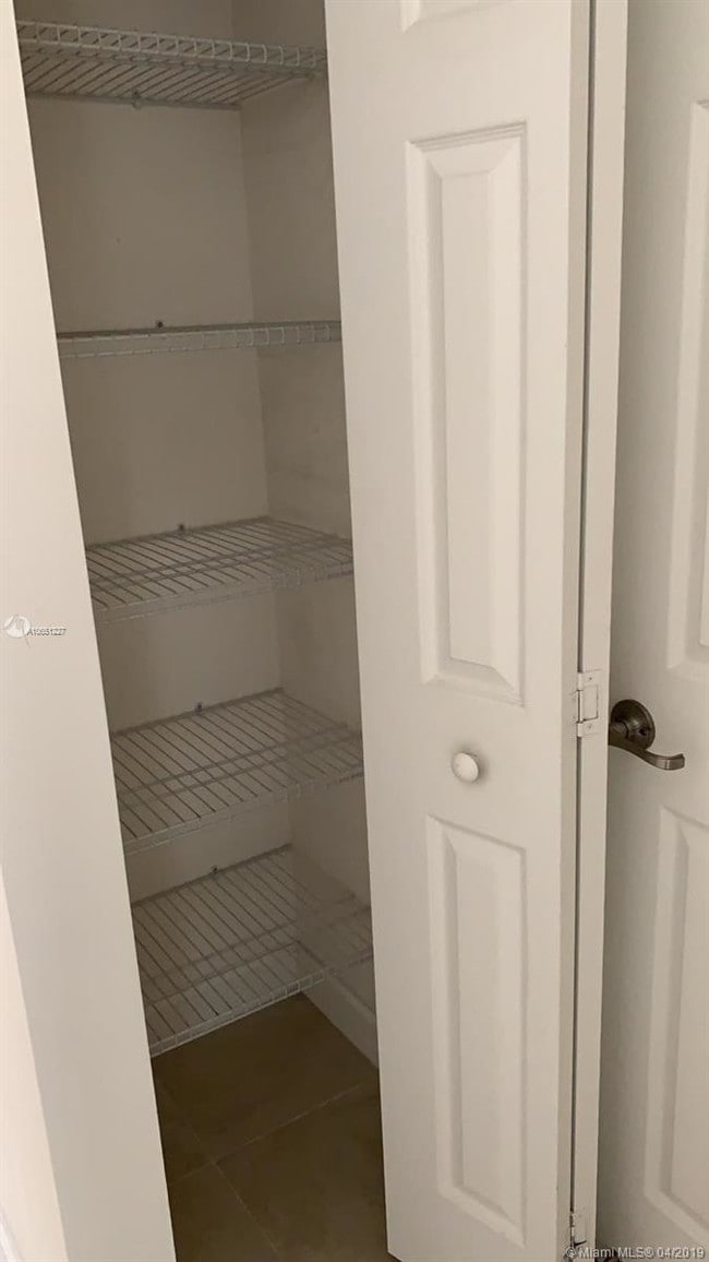 Building Photo - 6175 NW 104th Ct