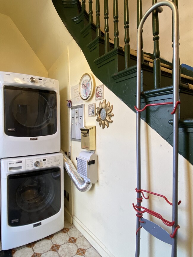 Entry level full-sized washer/dryer; bike rack. - 1618 8th St NW