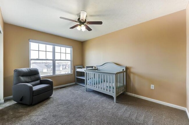 Building Photo - 6995 Hearthwood Dr