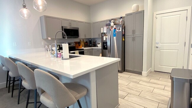 Building Photo - Spectacular 3 Bedroom Townhouse in Gate Community Near Sky Canyon and Centennial! Strip Views!