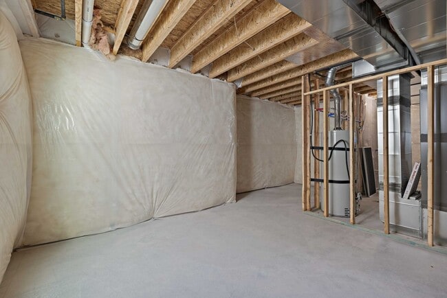 Building Photo - NEW HOME with large garage stalls and unfinished basement for additional storage