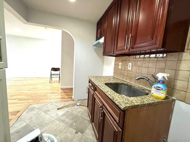 Building Photo - 104-27 38th Ave