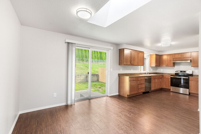 Building Photo - Recently updated 3 bdrm, 2 bath. Attached garage. Wrap around yard. Private upstairs bedroom and ...