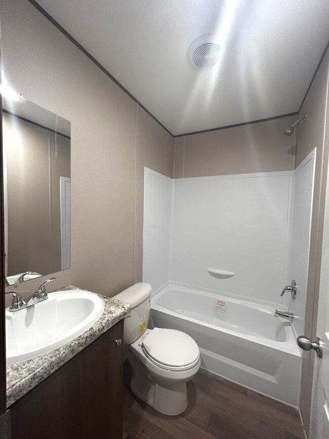 Building Photo - Brand new 4BR Mobile Home - Country living with City convenience!