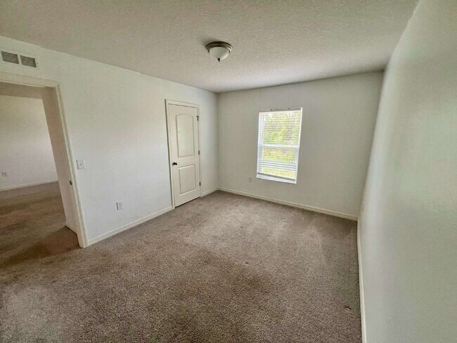 Building Photo - Spacious 4-Bedroom Home with Primary Suite...