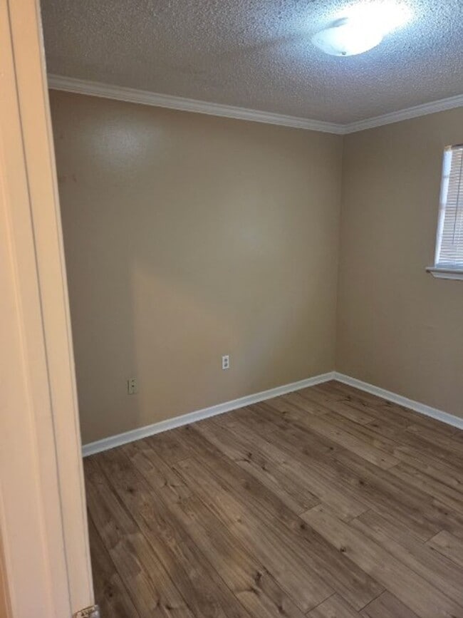 Building Photo - Rent with confidence, live with ease