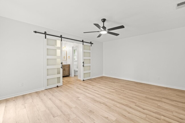 Building Photo - Renovated Home on Large Corner Lot in Coveted Strathy Hall