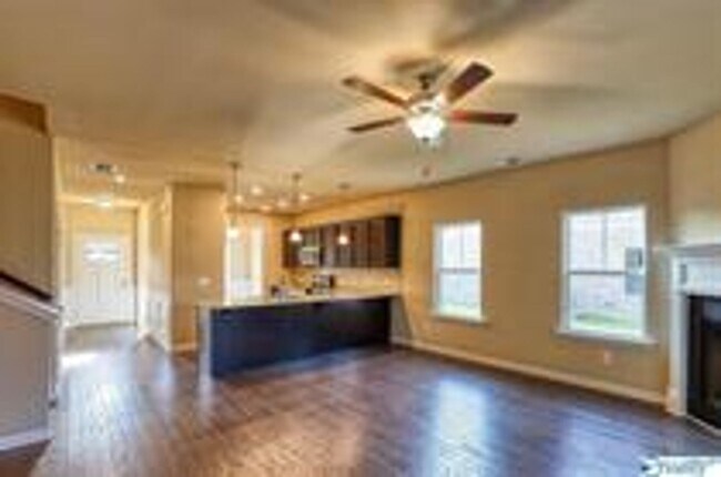 Building Photo - COMING SOON! Welcome to the Carlyle—where classic brick farmhouse charm meets a sleek, modern lif...