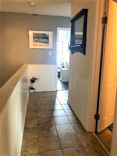 Upstairs hallway and second full bathroom - 2305 MERL CIRCLE