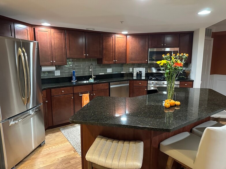 Kitchen with island - 4 Sterling Hill Ln