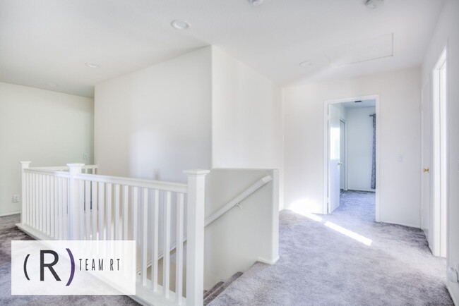 Building Photo - A Captivating and Charming 2 Story Home Ne...