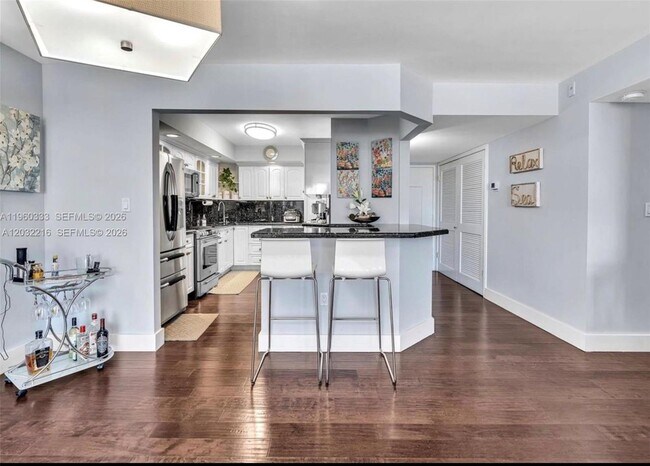 Building Photo - 6423 Collins Ave