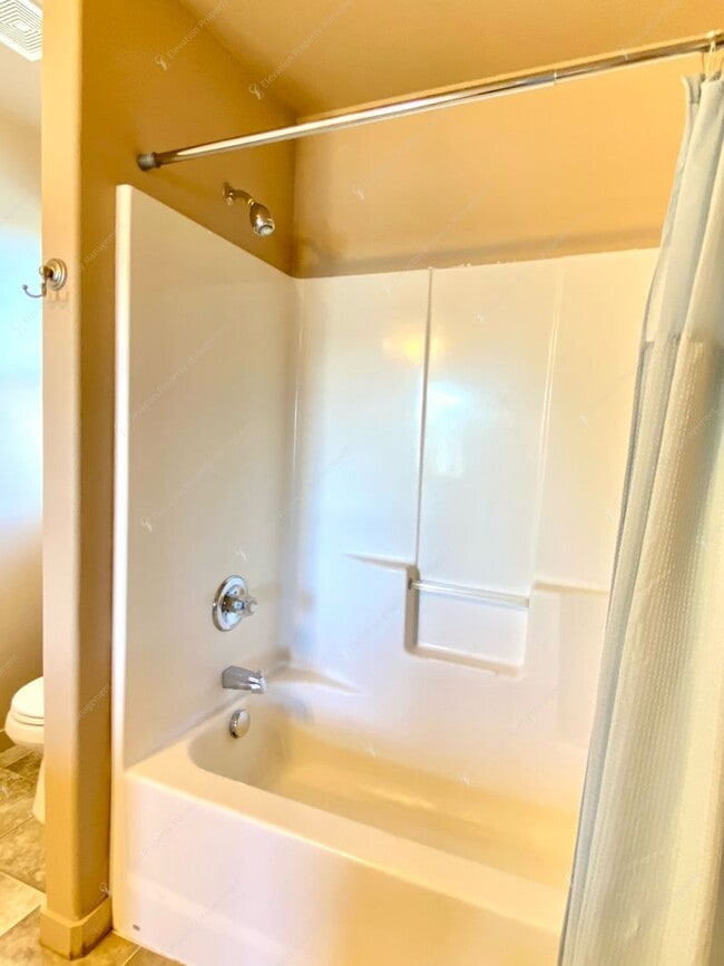 Building Photo - 3  BR home with new flooring in a great NE...