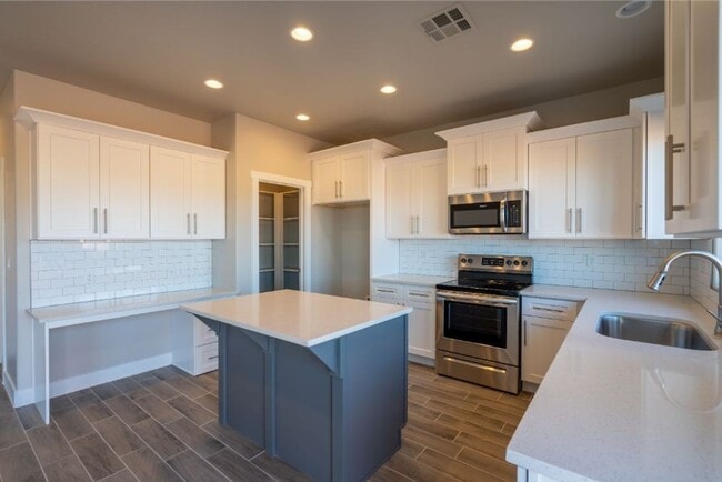 Building Photo - Amazing views! Like New 3 bedroom, 2.5 bath townhome, 2 car garage