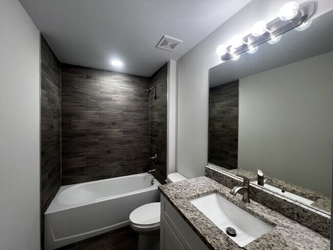 Building Photo - Move-In Special! Half Month FREE – APPLY by November 30th – Modern 3BR/2BA Duplex in Lehigh Acres...