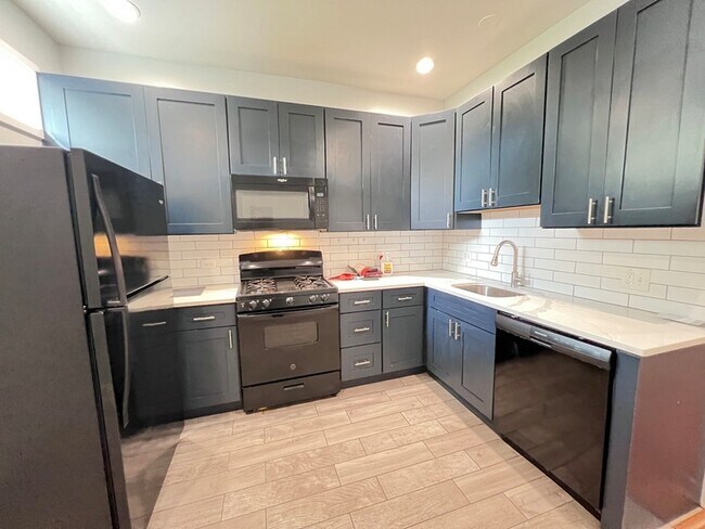 Building Photo - 6402 S Eberhart Ave