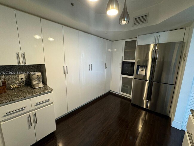 Building Photo - 6301 Collins Ave