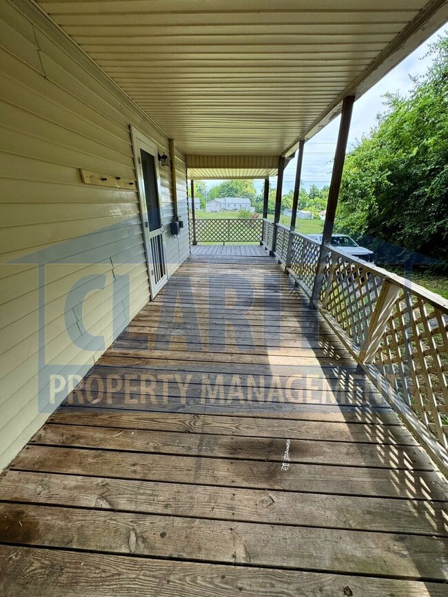 Building Photo - Two bedroom home w/ wrap-around porch!