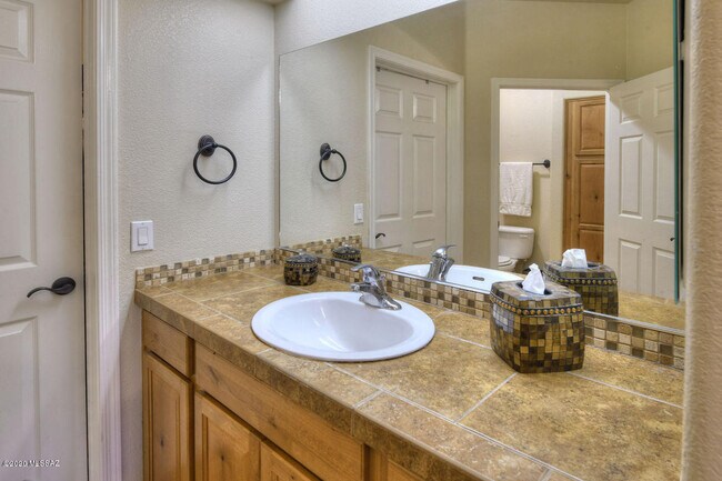 Building Photo - 7050 E Sunrise Dr