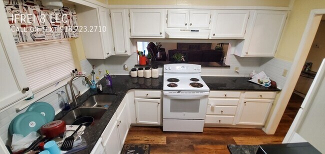 Building Photo - 1435 S 124th E Ave