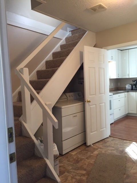Nice landing area that leads to the back yard, washer and dryer hook ups are available as seen in the photo. - 1185 6th Street Northwest
