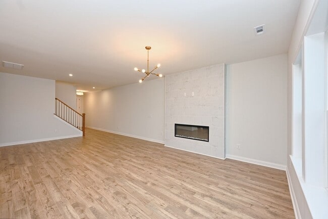 Building Photo - **BE THE LUCKY ONE TO LIVE IN THIS 2024-BUILT TOWNHOME**