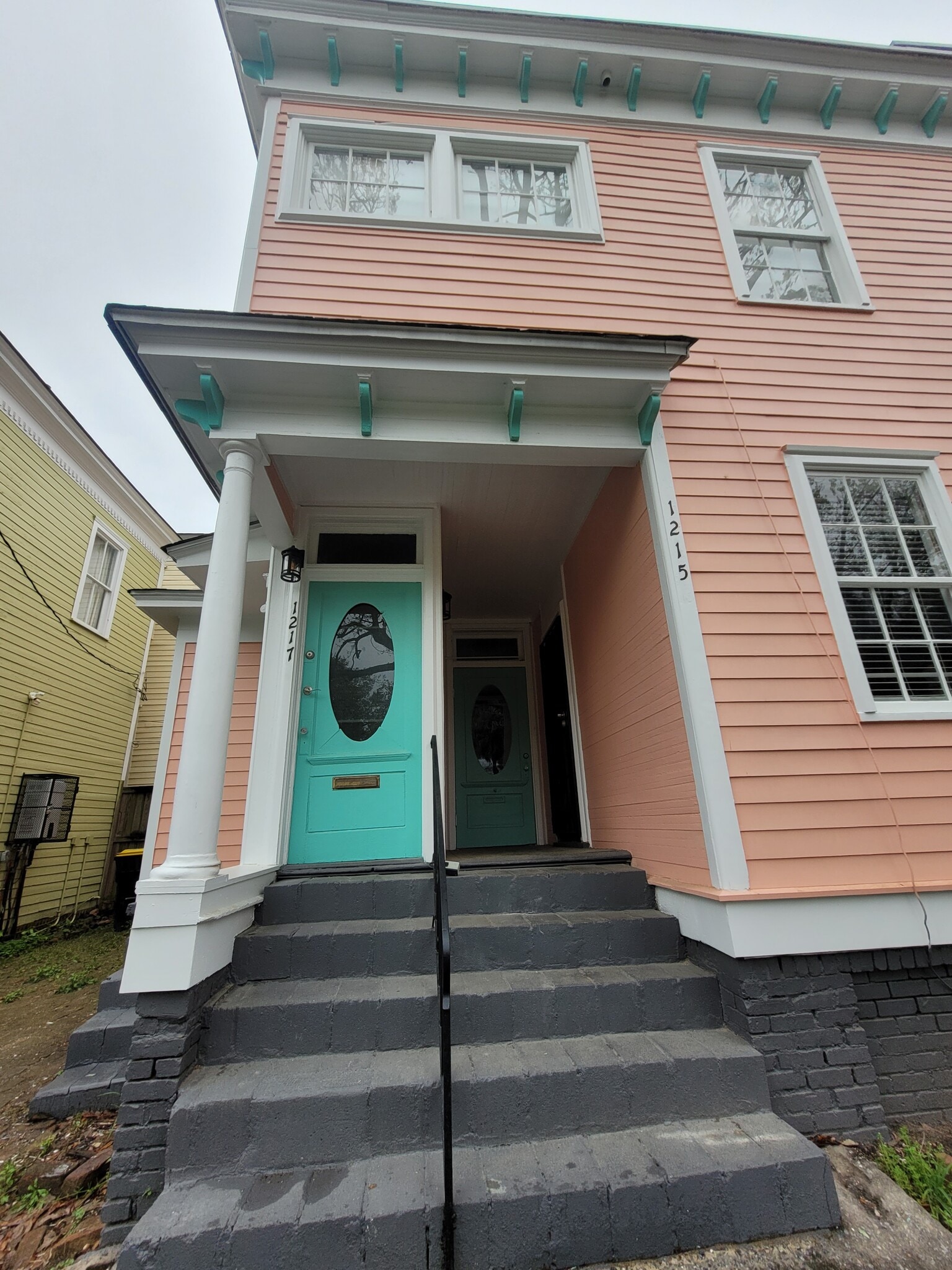 Patio/parking to the left of the duplex - 1215 Java Pl