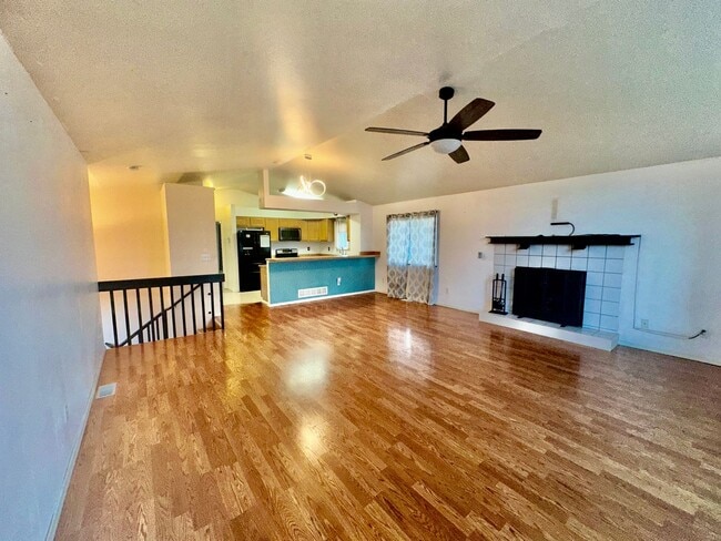 Building Photo - Check out the private fenced backyard!