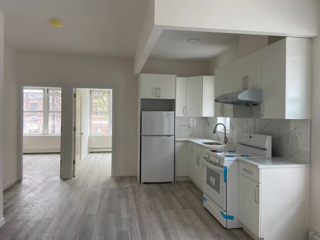 Building Photo - 7118-7110 10th Ave